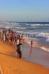 SRI LANKA, Colombo, Galle Face Green, people enjoying paddling on the beach, SLK5256JPL