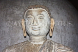 SRI LANKA, Dambulla Cave Temple (Golden Temple), Buddha statue in cave, closeup, SLK2790JPL