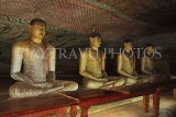 SRI LANKA, Dambulla Cave Temple (Golden Temple), row of seated Buddha statues in cave, SLK2864JPL