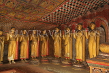SRI LANKA, Dambulla Cave Temple (Golden Temple), row of standing Buddha statues in cave, SLK2780JPL