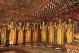SRI LANKA, Dambulla Cave Temple (Golden Temple), row of standing Buddha statues in cave, SLK2781JPL