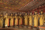 SRI LANKA, Dambulla Cave Temple (Golden Temple), row of standing Buddha statues in cave, SLK2782JPL