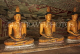SRI LANKA, Dambulla Cave Temple (Golden Temple), seated Buddha statues in cave, SLK2771JPL