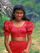 SRI LANKA, Kajugama (on Kandy Road), Cashewnut vendor, traditional cloth and jacket dress, SLK1564JPL