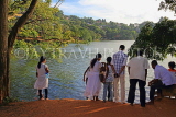 SRI LANKA, Kandy, Kandy Lake, people enjoying the view, SLK3687JPL