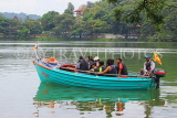 SRI LANKA, Kandy, Kandy Lake, people on boat tour, SLK3635JPL