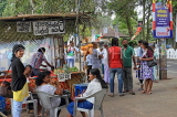 SRI LANKA, Kandy, Kandy lakeside, people and cafe scene, by the promenade, SLK3974JPL