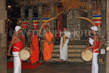SRI LANKA, Kandy, Temple of the Tooth (Dalada Maligawa), monks ready to enter shrine room, SLK3454JPL