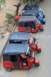 SRI LANKA, Kandy, three wheeler taxis lined up along street, SLK3794JPL