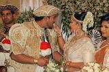 SRI LANKA, Kandy, traditional Kandyan Wedding, couple performing marriage rituals, SLK3815JPL