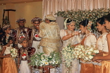 SRI LANKA, Kandy, traditional Kandyan Wedding, couple performing marriage rituals, SLK3816JPL