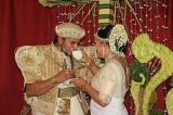 SRI LANKA, Kandy, traditional Kandyan Wedding, couple performing rituals, SLK3721JPL