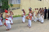 SRI LANKA, Kandy, traditional Kandyan Wedding, dancers welcoming groom and entourage, SLK4055JPL