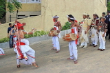 SRI LANKA, Kandy, traditional Kandyan Wedding, dancers welcoming groom and entourage, SLK4056JPL