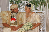 SRI LANKA, Kandy, traditional Kandyan Wedding, married ouple chatting, SLK3990JPL