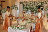 SRI LANKA, Kandy, traditional Kandyan Wedding, wedding cake being served, SLK4005JPL