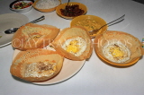 SRI LANKA, Kandy, traditional breakfast, Hoppers and egg Hoppers (rice pancakes), SLK6047JPL