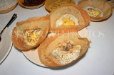 SRI LANKA, Kandy, traditional breakfast, Hoppers and egg Hoppers (rice pancakes), SLK6048JPL