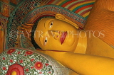 SRI LANKA, Kandy area, Asgiriya Monastery, large reclining Buddha in image house, SLK3195JPL
