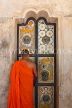 SRI LANKA, Kandy area, Asgiriya Monastery, monk openinig door to image house, SLK3200JPL