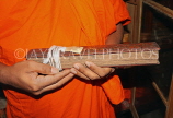 SRI LANKA, Kandy area, Asgiriya Monastery, monk showing Buddhist scrpitures on Ola leaves, SLK3220JPL