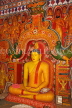SRI LANKA, Kandy area, Asgiriya Monastery, seated Buddha statue in the image house, SLK3210JPL