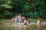 SRI LANKA, Kithulgala, rural scene, people crossing river by small catamaran, SLK160JPL