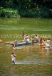 SRI LANKA, Kithulgala, rural scene, people crossing river in small catamaran, SLK161JPL