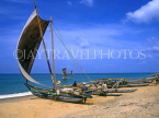 SRI LANKA, Negombo, catamarans on beach (going out to sea), SLK282JPL
