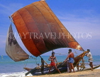 SRI LANKA, Negombo, fishermen and catamaran (fishing boat) on beach, SLK1616JPL