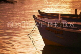 SRI LANKA, Negombo, fishing boat anchored in lagoon, dusk, SLK342JPL