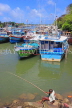 SRI LANKA, Negombo, fishing boats, and lone fisherman in Negombo Lagoon, SLK6082JPL