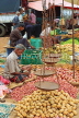 SRI LANKA, Negombo, market, fruit and vegetable market, vendor with scales, SLK2707JPL