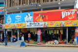 SRI LANKA, Pussellawa, town centre, advertisement hoardings above small shops, SLK4196JPL