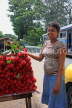 SRI LANKA, Rambutan fruit stall and vendor, along Kandy Road, SLK2462JPL