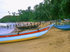SRI LANKA, south coast, Ambalangoda, fishing boats and fishermen hauling in nets, SLK374JPL
