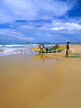 SRI LANKA, south coast, Bentota, catamaran and fishermen on beach, SLK237JPL