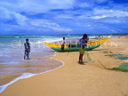 SRI LANKA, south coast, Bentota, catamaran and fishermen on beach, SLK279JPL