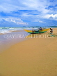 SRI LANKA, south coast, Bentota, catamaran and fishermen on beach, SLK3279JPL