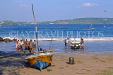 SRI LANKA, south coast, Galle, fishermen pushing out boats to sea, SLK1711JPL