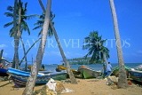 SRI LANKA, south coast, Gintota, fishing boats along beach, village scene, SLK2159JPL