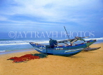 SRI LANKA, south coast, Mount Lavinia, catamaran (traditional fishing boat) on beach, SLK1521JPL