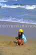 SRI LANKA, south coast, Mount Lavinia (near Mt Lavinia Hotel), child playing in sand, SLK1732JPL