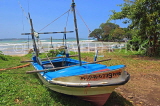 SRI LANKA, south coast, Weligama, fishing boat, Taprobane Island in background, SLK4686JPL