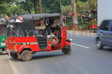 SRI LANKA, street scene, with three wheeler taxi, along Kandy Road, SLK2507JPL