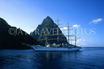 ST LUCIA, cruiser with sails, passing by The Pitons, STL604JPL