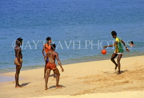 ST LUCIA, locals palying on beach, STL695JPL