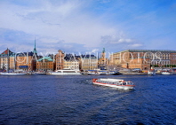 SWEDEN, Stockholm, Old Town (Gamla Stan), skyline, and sightseeing boat, SWE102JPL