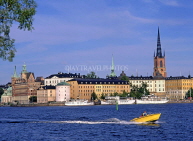 SWEDEN, Stockholm, Old Town (Gamla Stan), skyline and speed boat, SWE108JPL