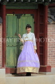 South Korea, SEOUL, Changdeokgung Palace, woman in Hanbok attire posing for photo, SK225JPL